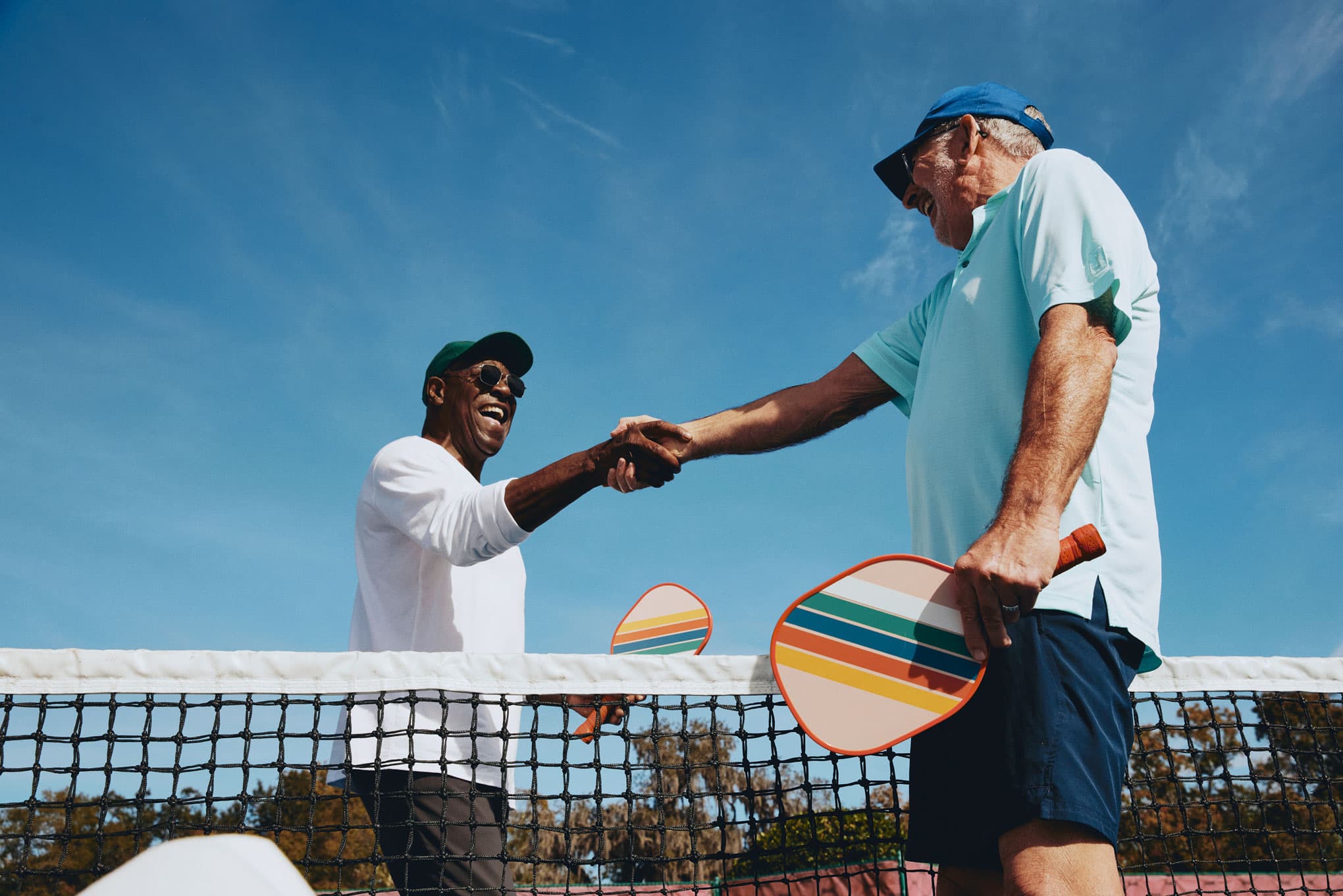 Men shaking hands after a game of pickleball